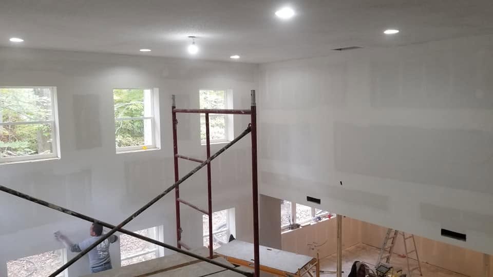 Drywall finishing — tall interior
