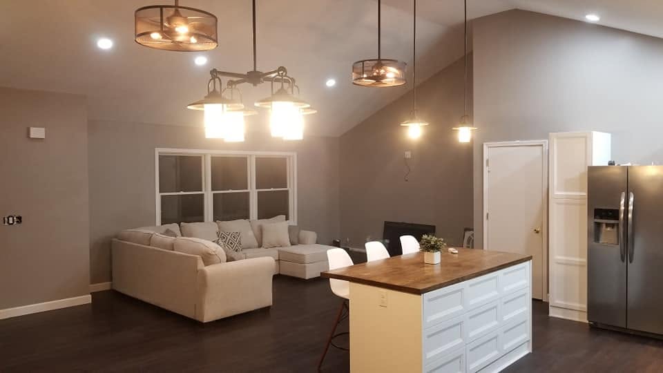Living room and kitchen — wide view