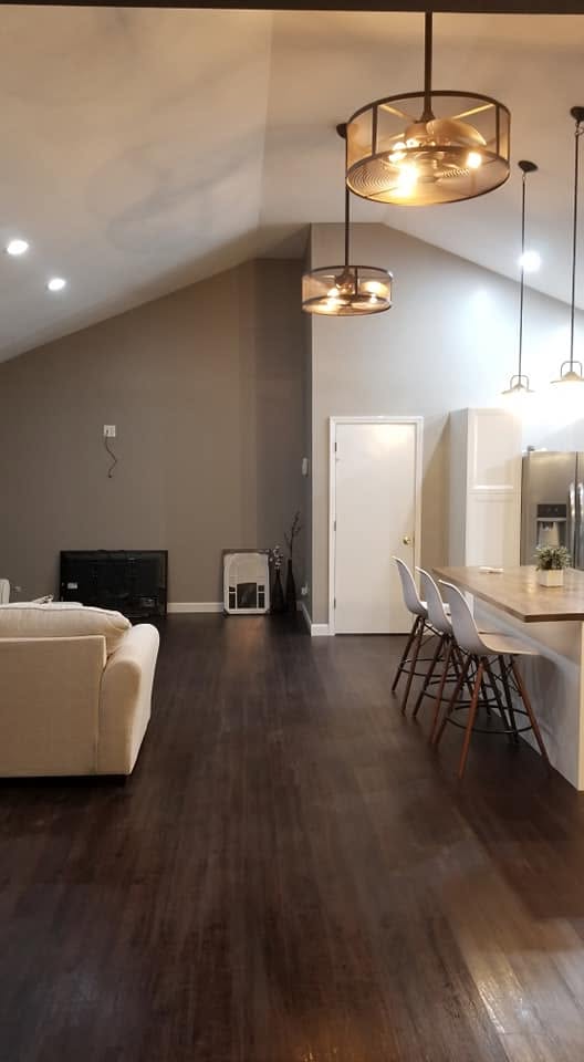 Living room fireplace and kitchen