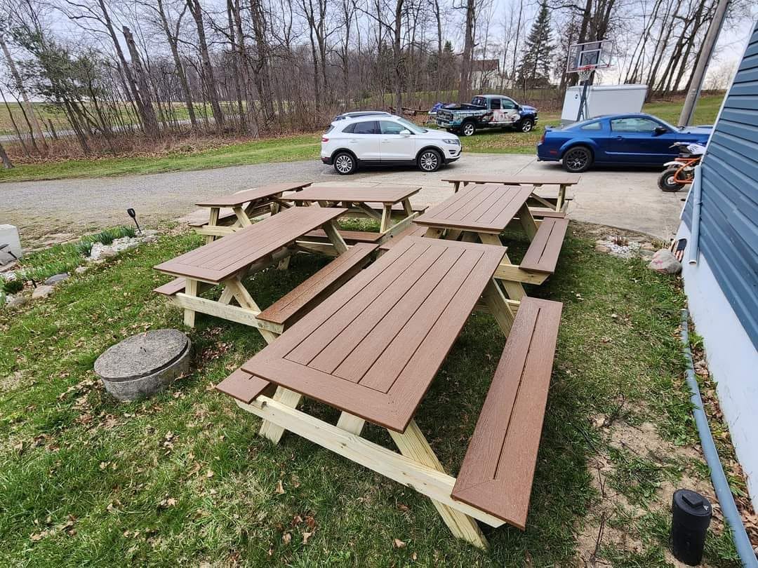 Finished picnic tables built by Nick and Keaton Salyers